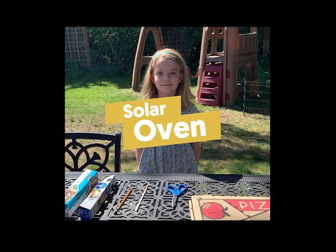 Solar Oven with ODOE's Director, Janine Benner.