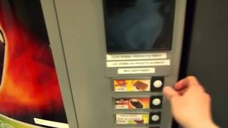 preview picture of video 'Purchasing a Walls ice cream from a vending machine at my hotel the Ibis Milano Centro in Milan'