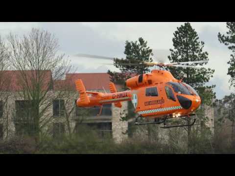 Air ambulances G-HMDX and G-HEMC meet at the Addenbrooke's helipad