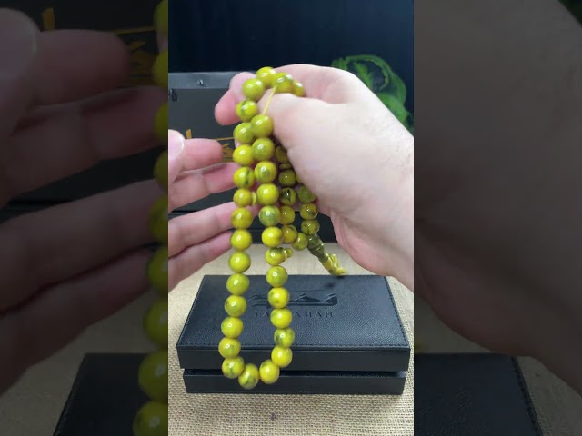 مسباح مسكي أصفر زيتي ممزوج بالأخضر