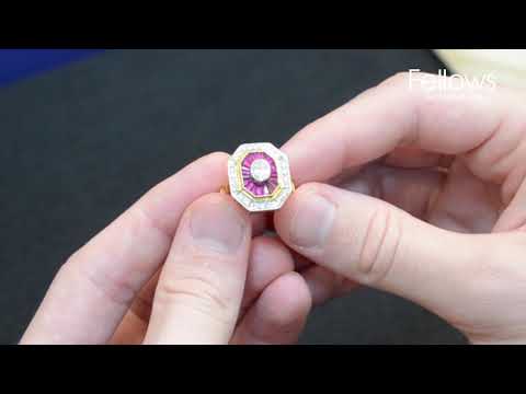 An 18ct gold diamond and ruby dress ring.