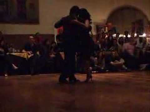  Ezequiel Paludi  and  Geraldine Paludi  are  dancing  to  the  tango  "  Amurado  "
