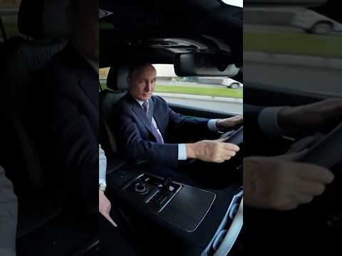 Putin takes new Volga SUV for test drive at factory