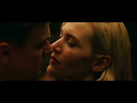 Trailer image: April and Frank framed by a picture window, the score’s unresolved cadence hanging in the air