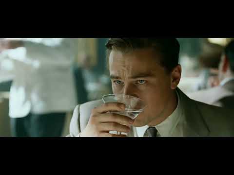 Revolutionary Road trailer still: Frank and April Wheeler dancing in a 1950s party glow