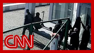 Surveillance video shows Russian forces shooting civilians