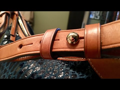 Adjusting Dooney & Bourke Peg and Slit Strap
