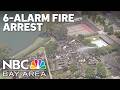 Arrest made in 6-alarm fire at Foster City condominium complex