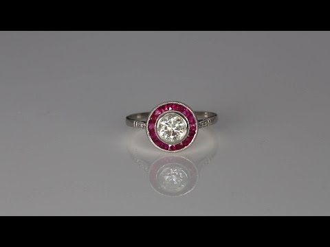 ART DECO  76 CT DIAMOND AND  56 CT RUBY SOLITAIRE PLATINUM TARGET CLUSTER RING