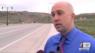 Engineers look at road signs after Mountain View Corridor crash