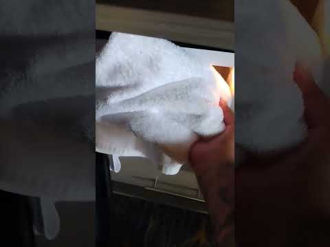 WHITE TOWEL IN THE MICROWAVE