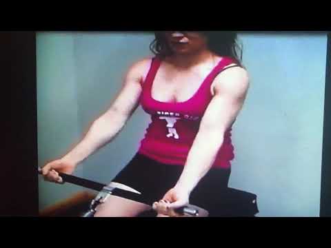 April pumps up biceps and flexes