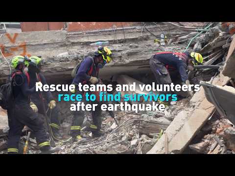 Rescue teams and volunteers race to find survivors after earthquake