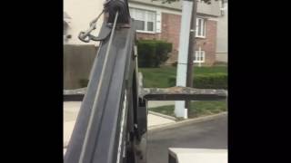 Towing car from blocking driveway queens NYC