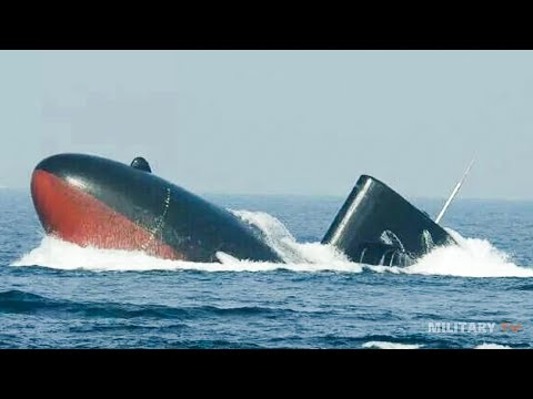 How does the submarine rise and dive