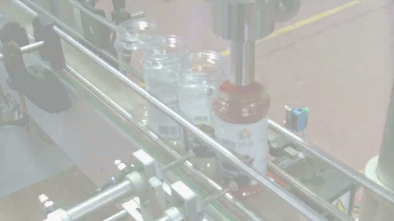 Round Jar Labeling Machine Integrated with Powder Auger Filler by TADBIK