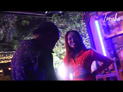 Excited Single Dee during Focus video shoot with Sasha Vybez