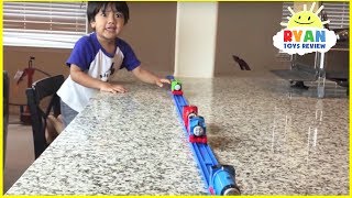 Thomas and Friends kid playing with trains around the house
