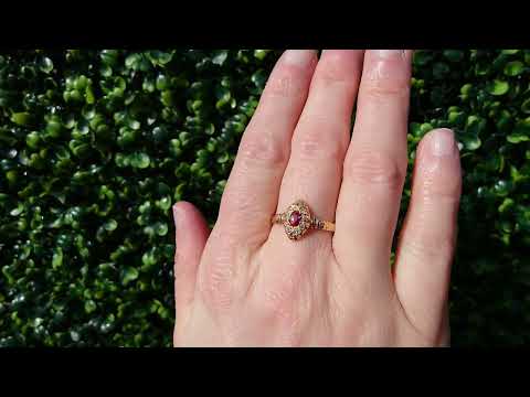 An antique ruby and diamond cluster ring