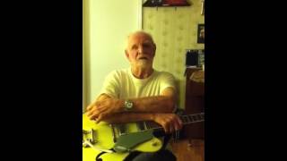 Bob Russell dec 2012 playing guitar Merle Travis style pick