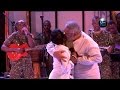 Jerry Rawlings gives Akosua Adjapong an electrifying peck