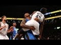 Glen 'Big Baby' Davis carries Gerald Wallace out of bounds!