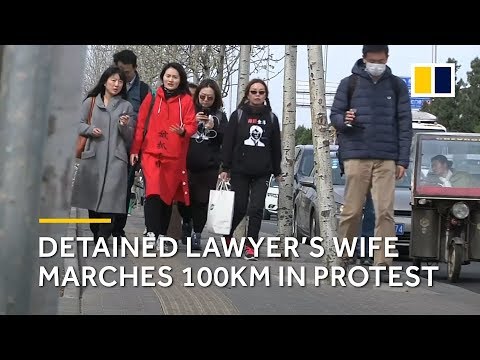 Detained lawyer’s wife marches 100km in protest in China