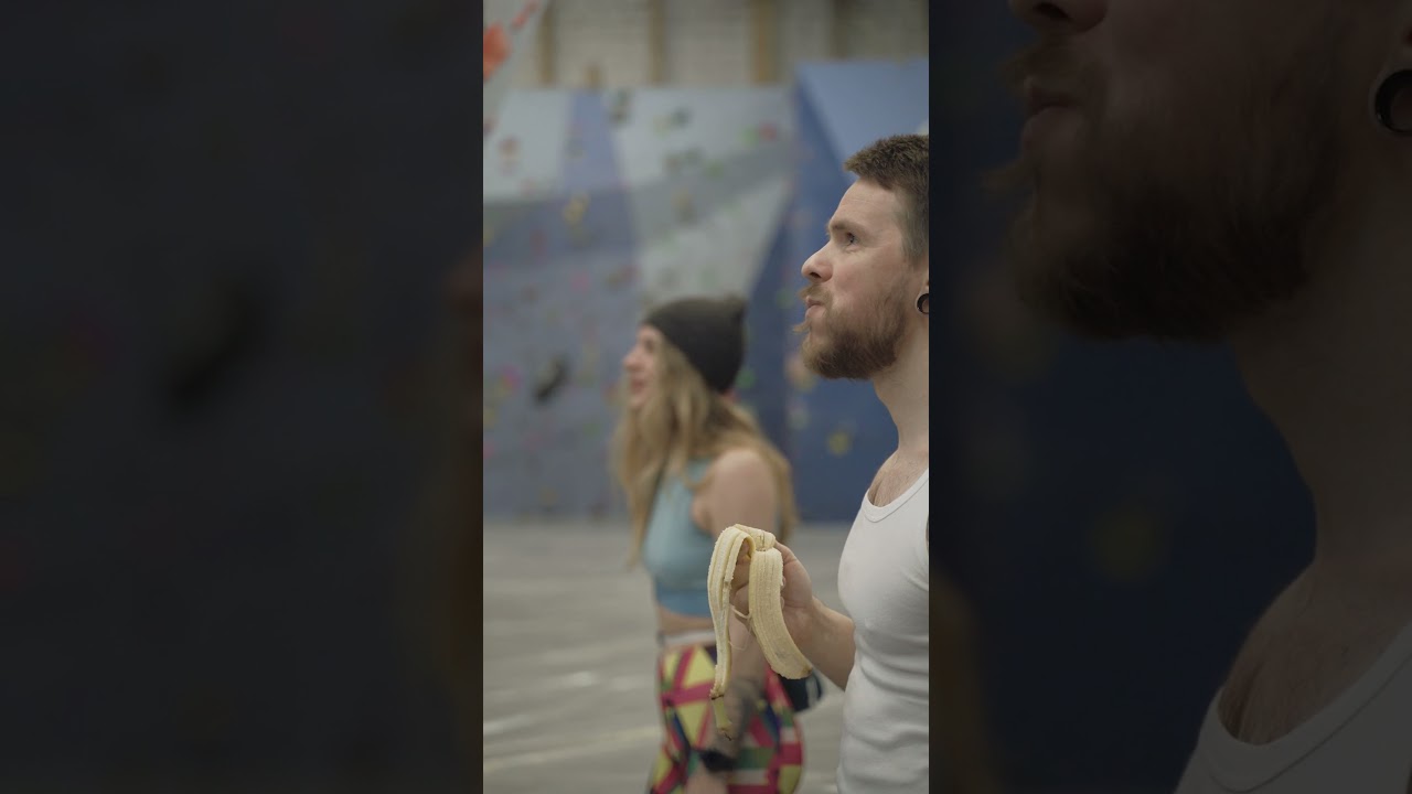 Beautiful Woman Smiling and Man Eating Banana stock footage copyright free videos