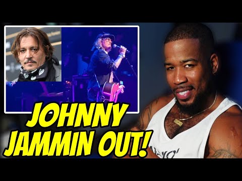 JOHNNY JAMMIN OUT ON THE GUITAR AFTER HIS WIN!