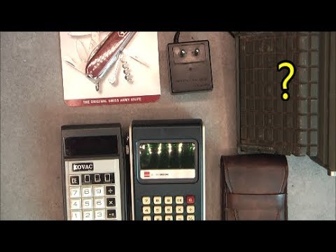 Giant fleamarket finds: vintage calculators and tank NV periscope