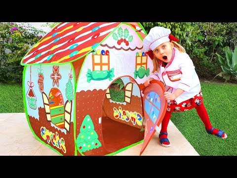 Alisa is cooking a gingerbread house