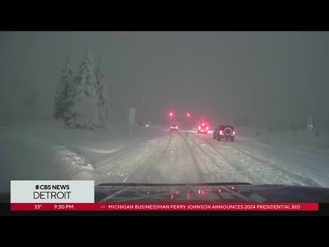 A view of road conditions Friday night as snowfall continues in SE Michigan