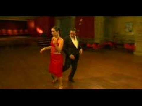  Luiza Paes  and  Norberto Esbrez  are  dancing  to  the  nontraditional song  "  Mujer Sola  "  by  Tango Lorca