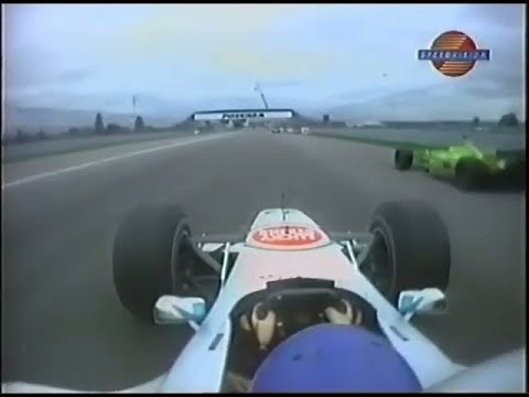 2000 F1 USA GP - Jacques Villeneuve (BAR) show anger to Marc Gené (Minardi) while lapping him
