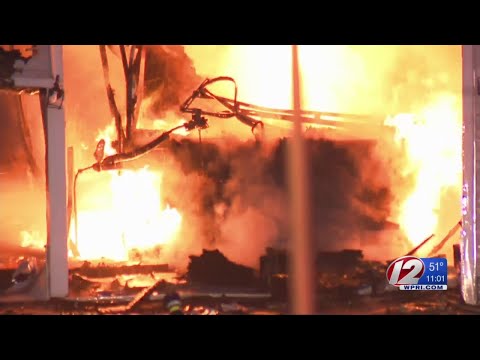 Crews battle stubborn garage fire in Freetown