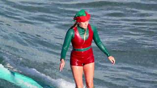 Santa and his elves take a much needed break to go surfing