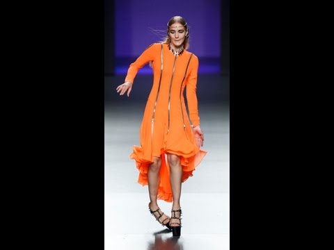 Model trips during Maria Escote Fall/Winter 2012-2013 fashion show