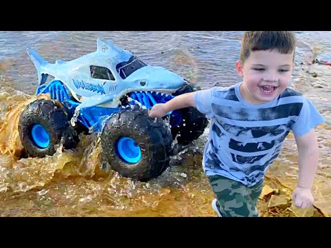 MONSTER TRUCK TOYS in WATER with CALEB & Dad!  Monster Jam MEGALODON STORM All-Terrain RC Truck