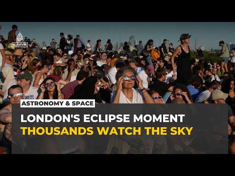 Thousands gather in London to watch rare partial solar eclipse