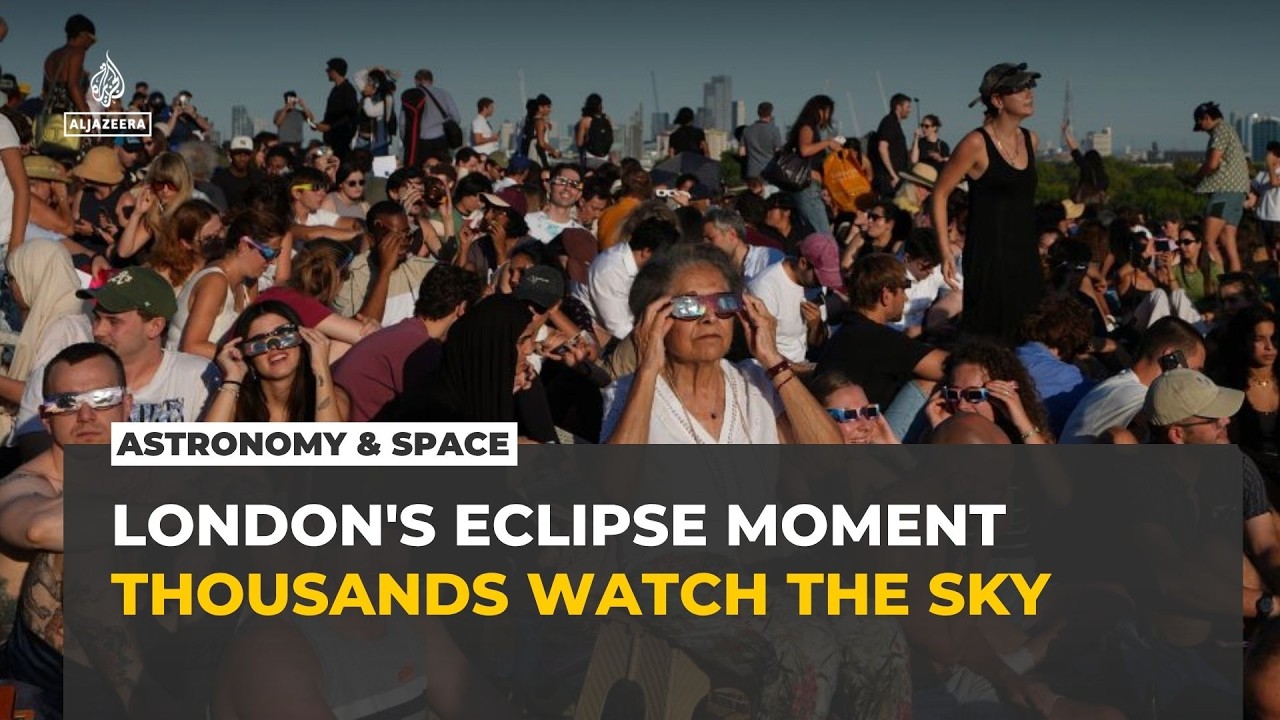 Thousands gather in London to watch rare partial solar eclipse