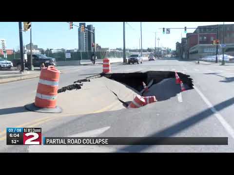 Partial road collapse on state street