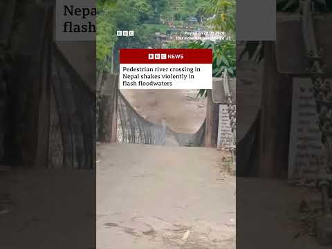 Pedestrian river crossing in Nepal shakes violently in flash floodwaters. #BBCNews
