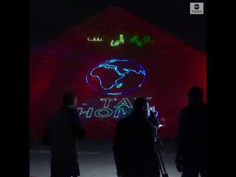 Pyramids in Giza lit up with messages urging people to stay home amid COVID-19 outbreak | ABC News