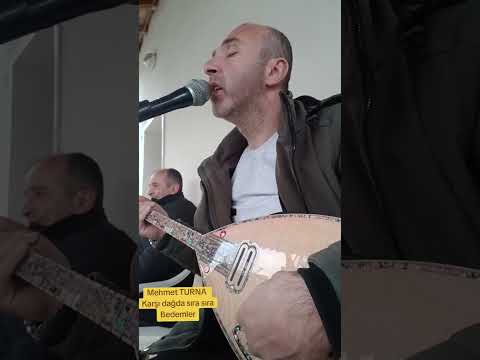 Mehmet TURNA Karşı dağda sıra sıra Bademler