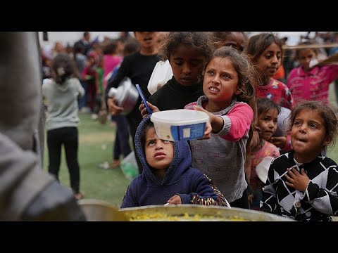 Video Thumbnail: Palestinians wait in line for food at Gaza charity kitchen