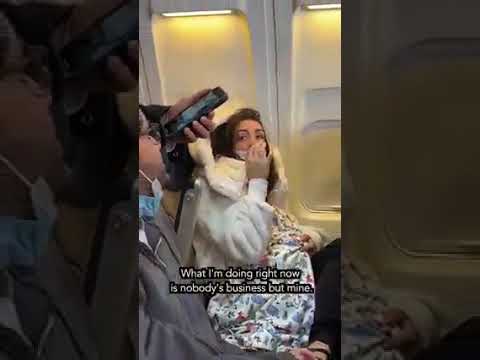 White Women Seen Breast-Feeding A Cat Onboard An Aeroplane