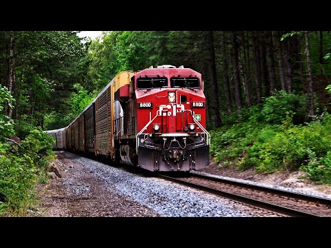 Big CPKC Trains With Multiple Mid DPUs Climbing Grade On The Cascade Sub