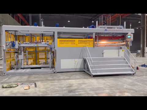 Automatic sheet load and unload thick sheet thermoforming machine