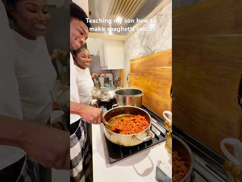 Teaching my son how to make spaghetti sauce