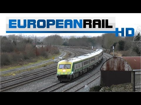 Irish Rail 201 loco 221 + Mark 4 operates on the Up Slow Line at Stacumny Bridge